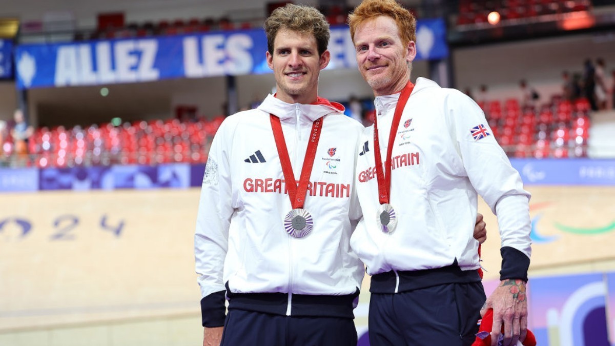 Stephen Bate and Chris Latham on the podium at Paris 2024 where they won the silver medal. GETTY IMAGES